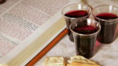 Bread and wine beside bible