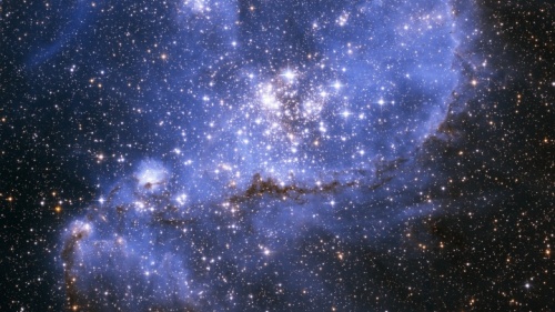 Estrelas e galáxias no espaço sideral.