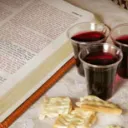 Bread and wine beside bible
