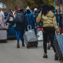 Refugiados ucranianos no posto de controle da Eslováquia.