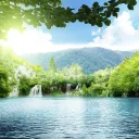Um cenário tropical de um lago e cachoeiras.