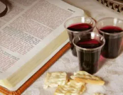 Bread and wine beside bible