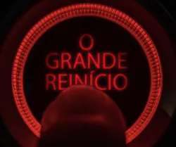 Um dedo apertando um botão "reset" (re-início).