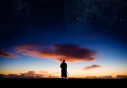 A silhueta de uma pessoa.